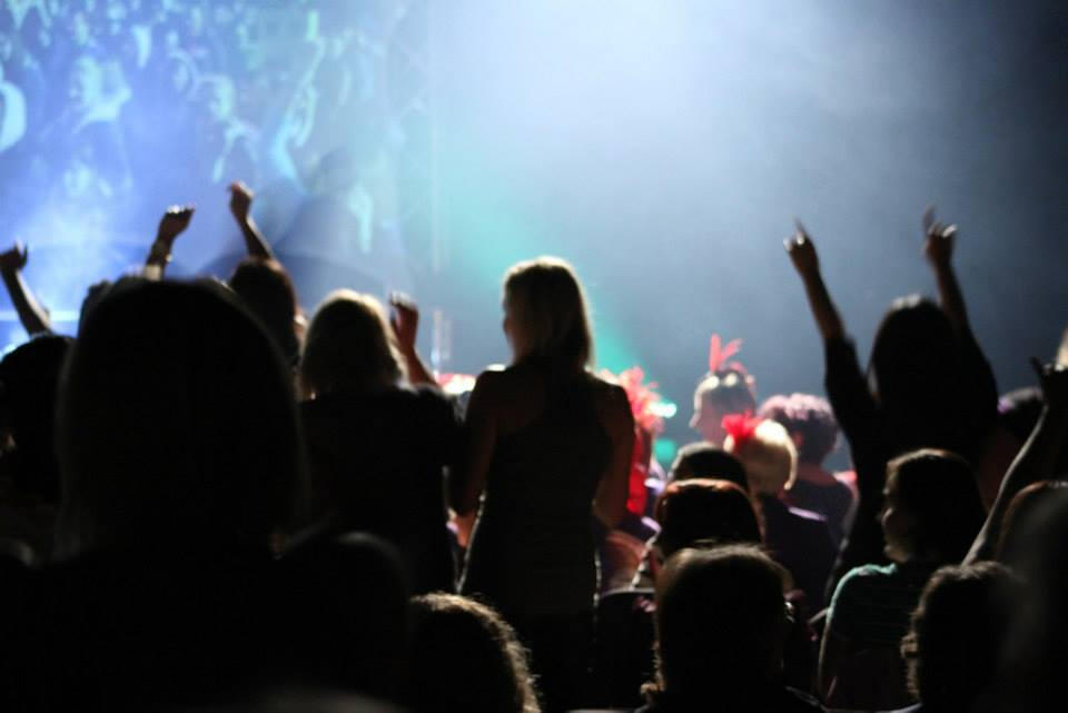 Canadian Storm - Tom Rooney performing as a Naval officer Headline Performer and author Tom Rooney performing his Naval officer show on stage full of screaming fans