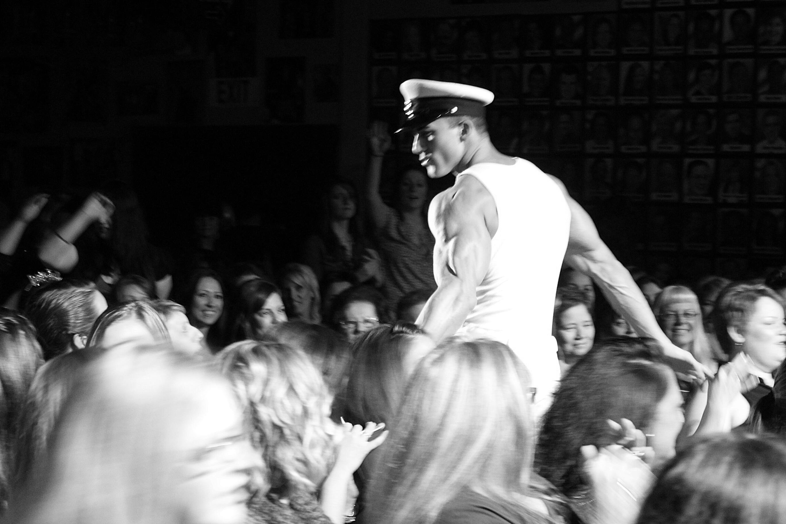 Canadian Storm - Tom Rooney in the audience as a Naval officer Headline Performer and author Tom Rooney performing his Naval officer show in a audience full of screaming fans